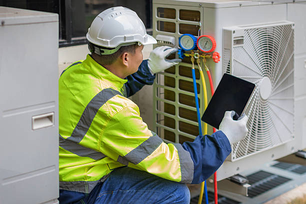 Professional Hvac technician working in Kings Park, NY
